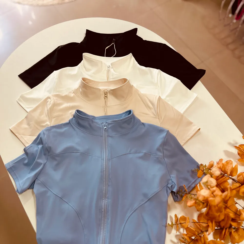 Blusa zíper poliamida manga curta