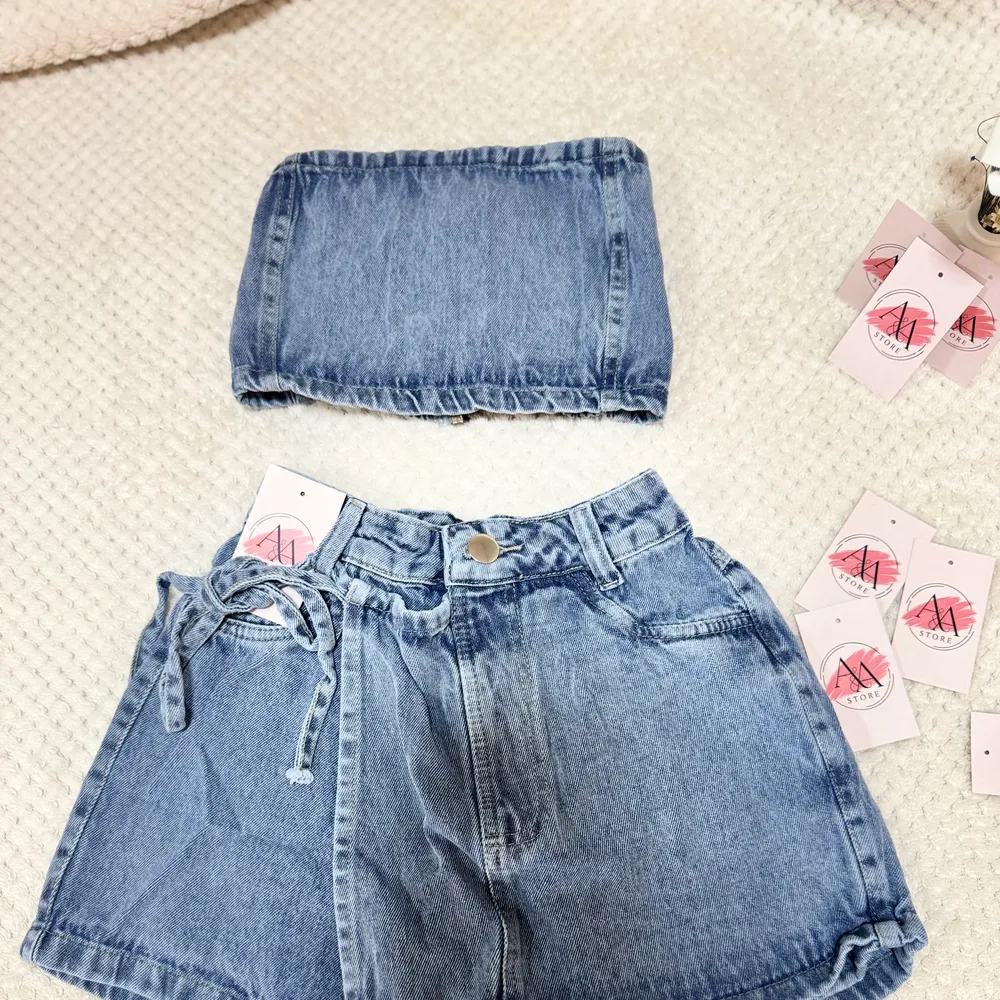 Conj short saia