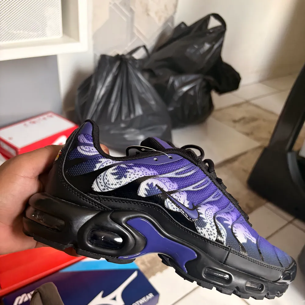 Tenis TN