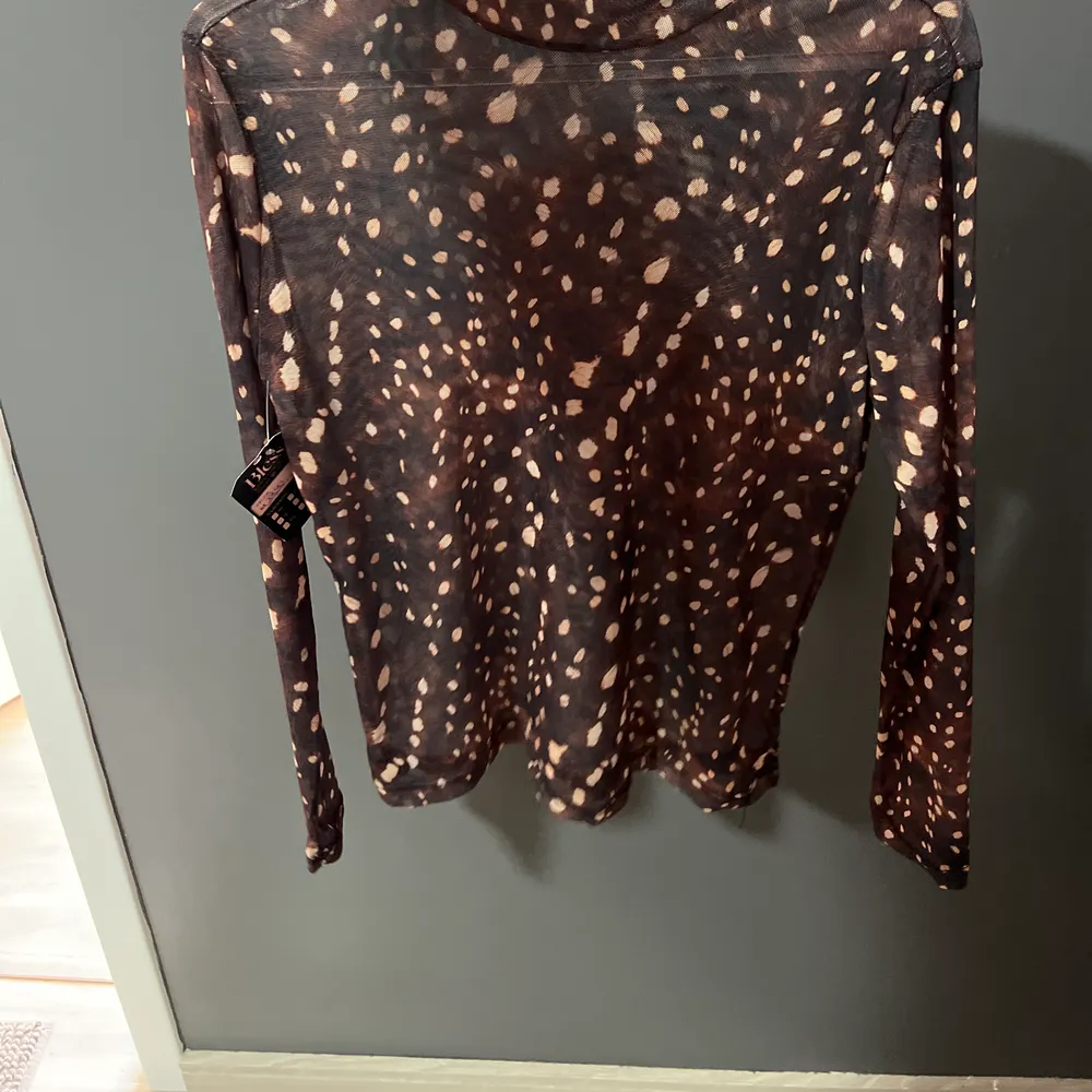 Blusa Tule