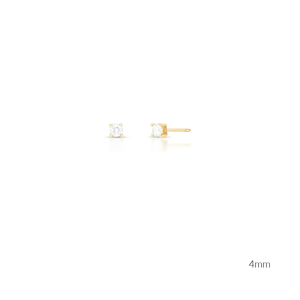 BRINCO SOLITARIO PONTO DE LUZ ZIRCONIA REDONDO 4 GARRA LATERAL VAZADO 4MM BAN. DOURADO /INCOLOR - 02172020601500