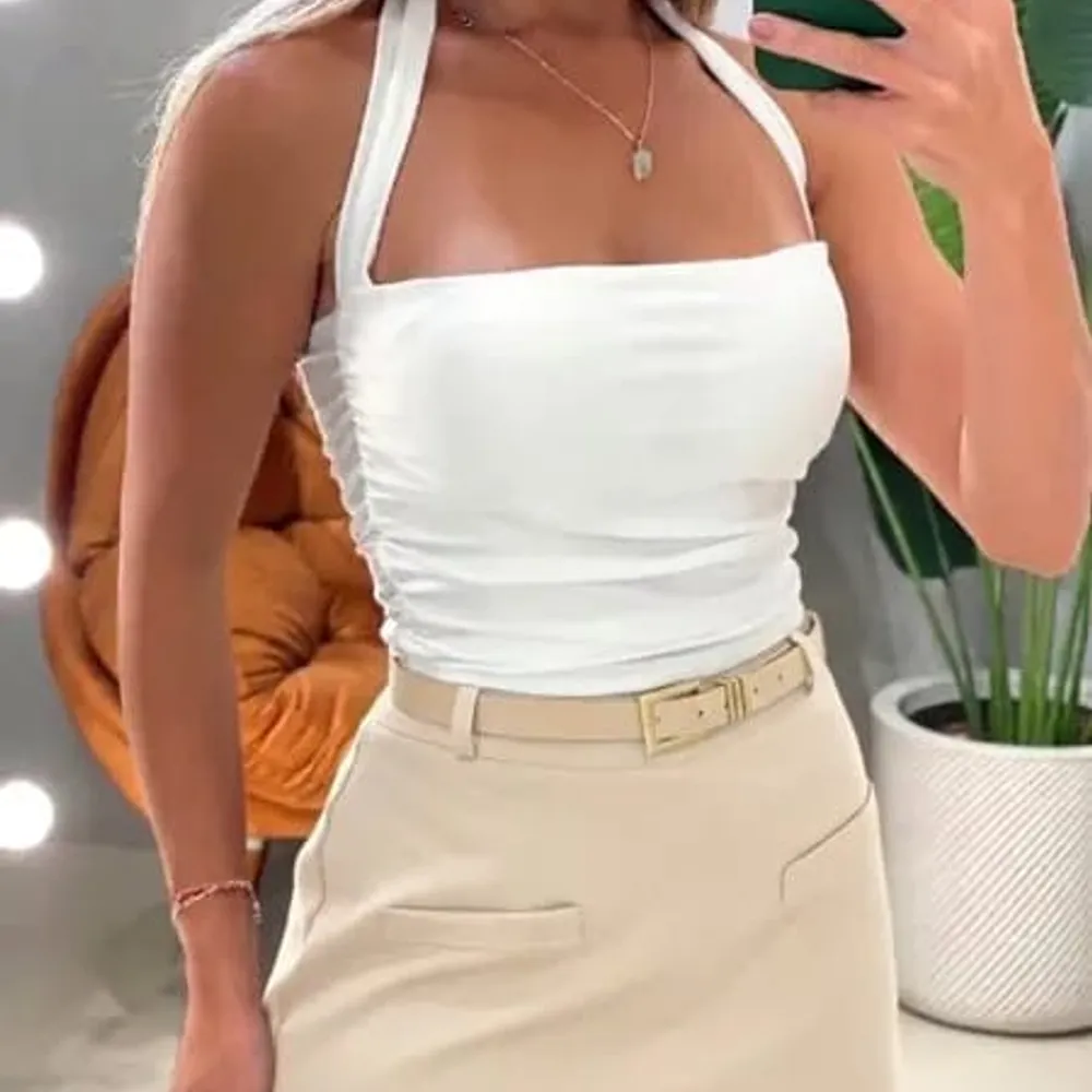 Shorts Saia Alfaiataria Bolso Falso com cintoTam M cor Bege