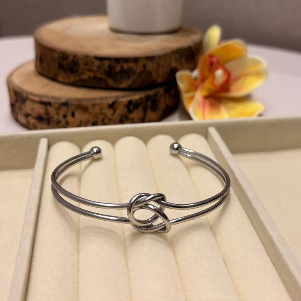 Bracelete duplo nó em aço inoxidável