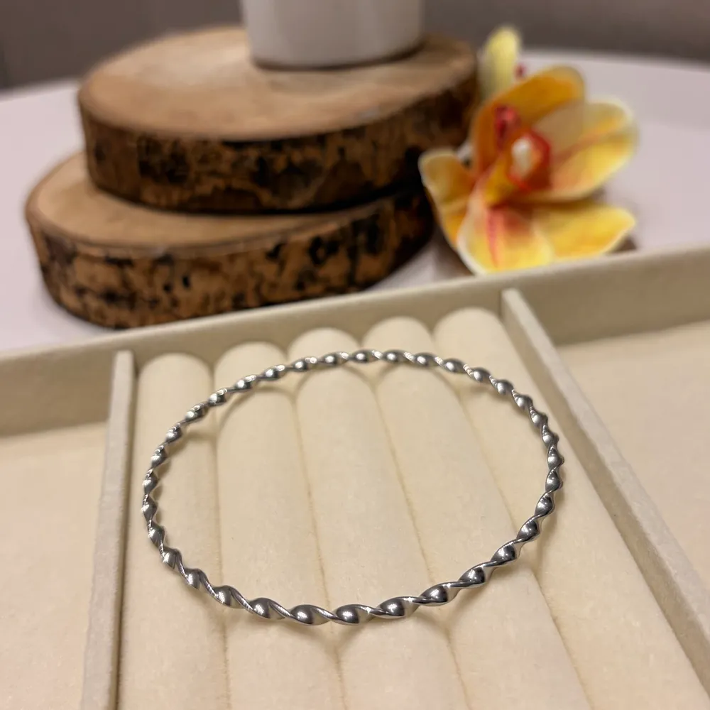 Pulseira rígida espiral em aço inoxidável 